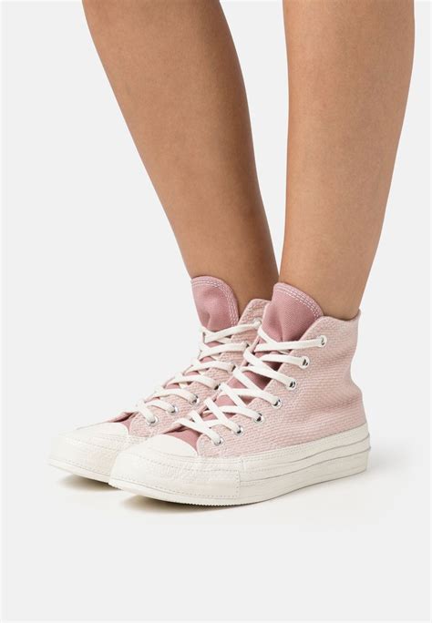 Flamingo Pink Converse: From Sports Courts to Runways